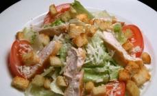 Caesar salad with smoked chicken and croutons